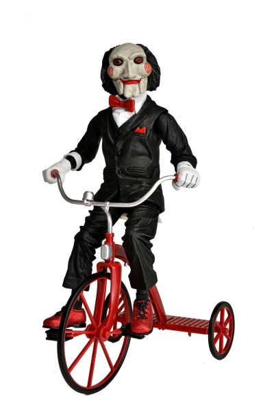 Saw - Billy mit Dreirad (mit Sound) NECA 30cm